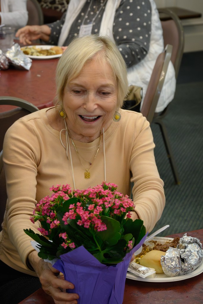 Carol wins the door prize